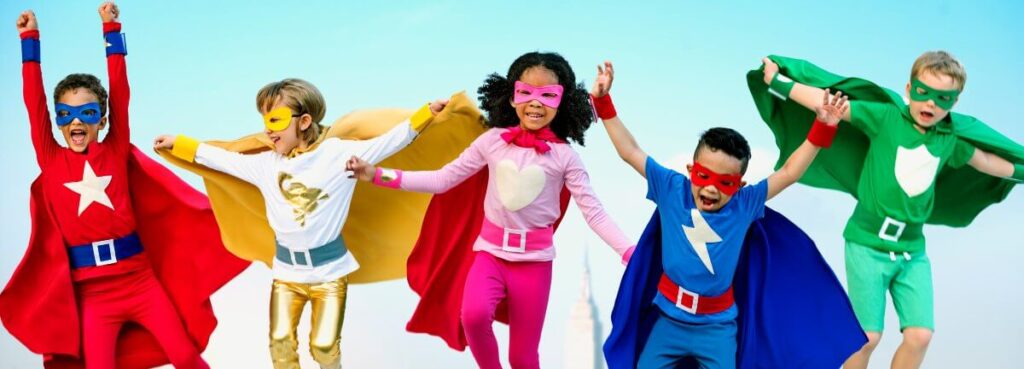 kids cosplaying as superheroes