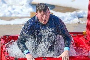 FDS partner taking a plunge at the 2025 polar plunge event.