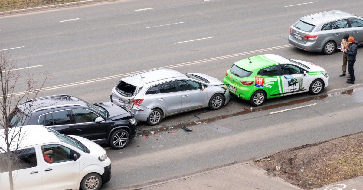 A car crash with three vehicles.
