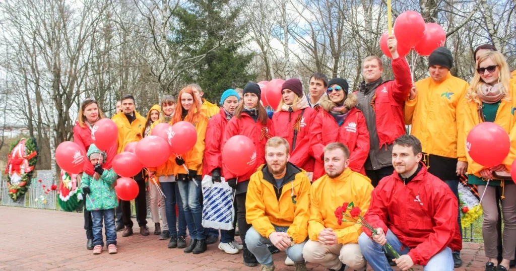 People taking a photo at a festival.